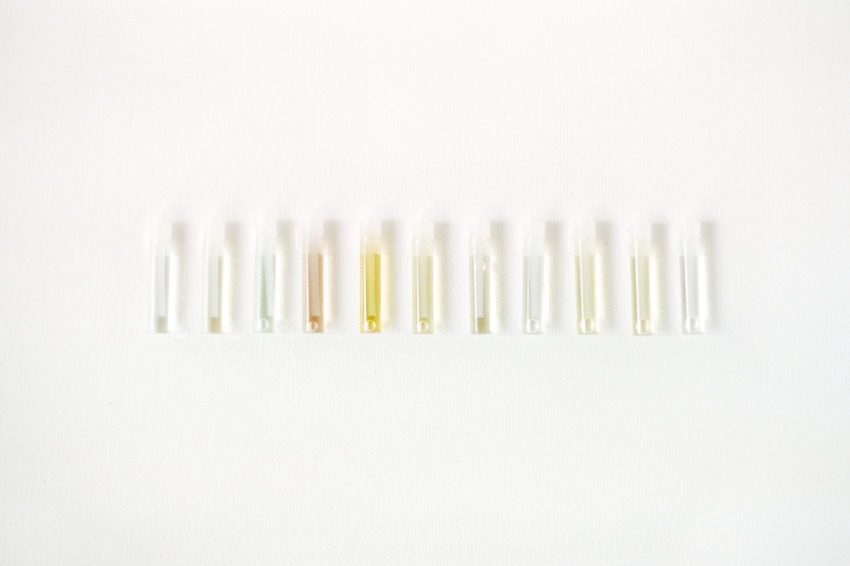 perfume vials in a row