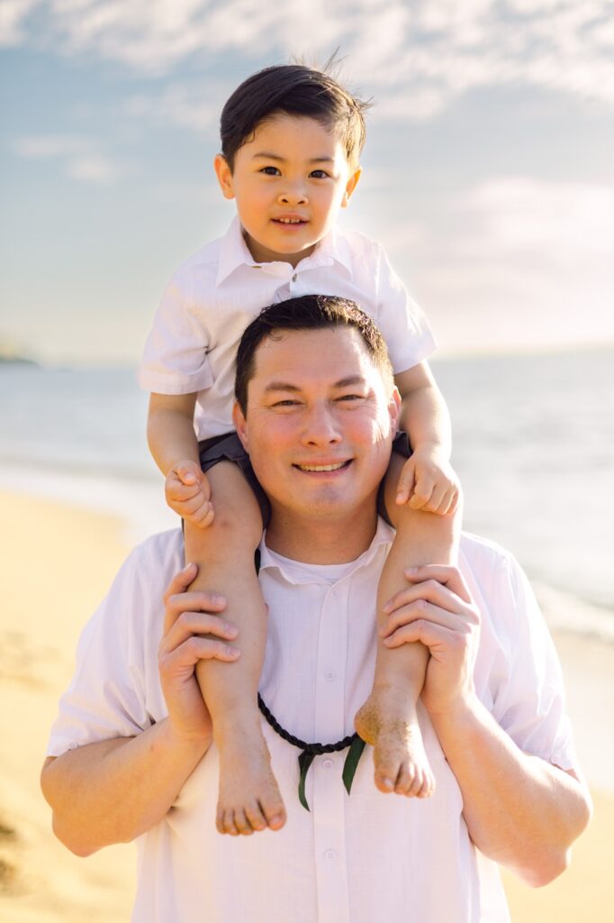 dad and son at beaching Kaanapali for sunset family photos