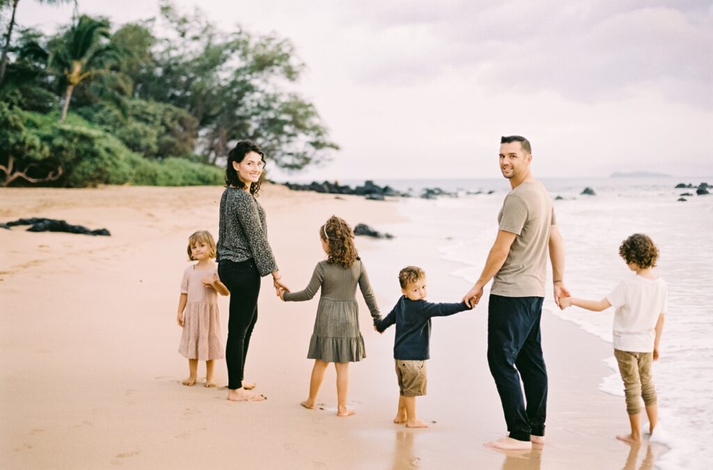 Rainy day Maui family photos at beach in Wailea