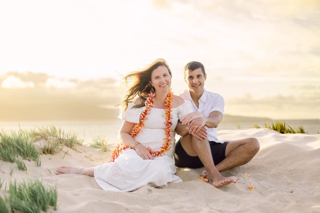 happy couple during sunset beach maui maternity photo session 