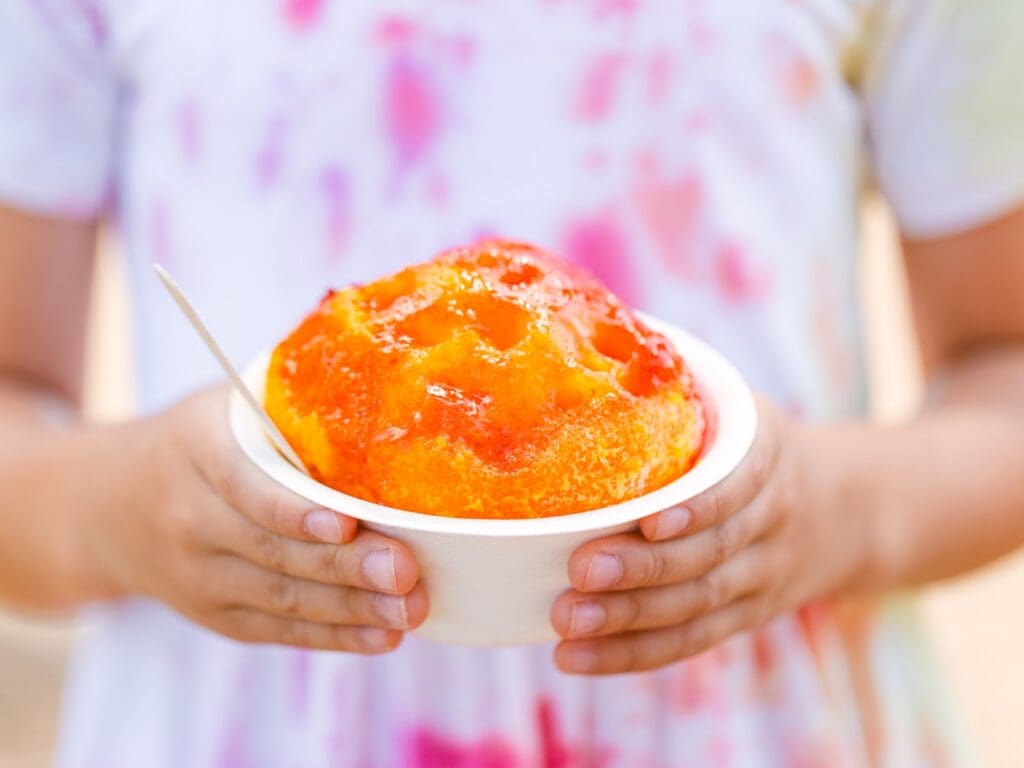 Ululani’s Hawaiian Shave Ice with li hing mui mango syrup on Maui