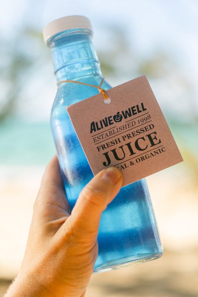 bottle of Alive & Well fresh pressed coconut water