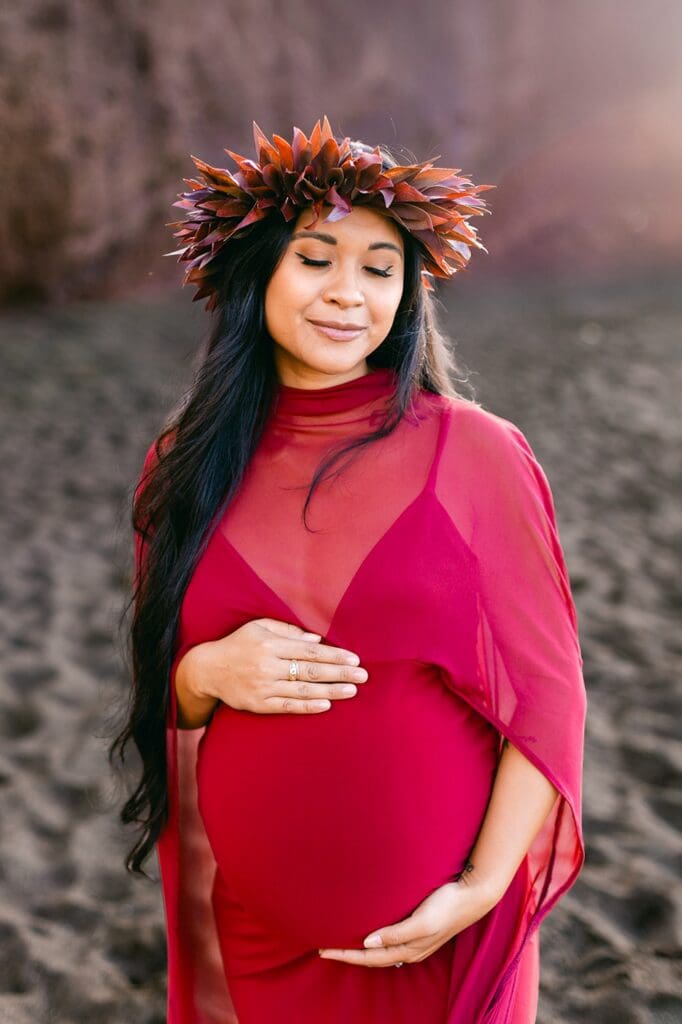 South Maui maternity session dress movement wind black sand shoreline