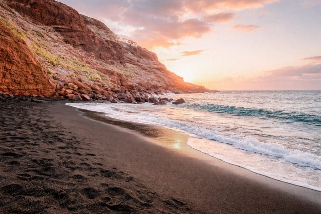 sunset at maui black sand beach in makena