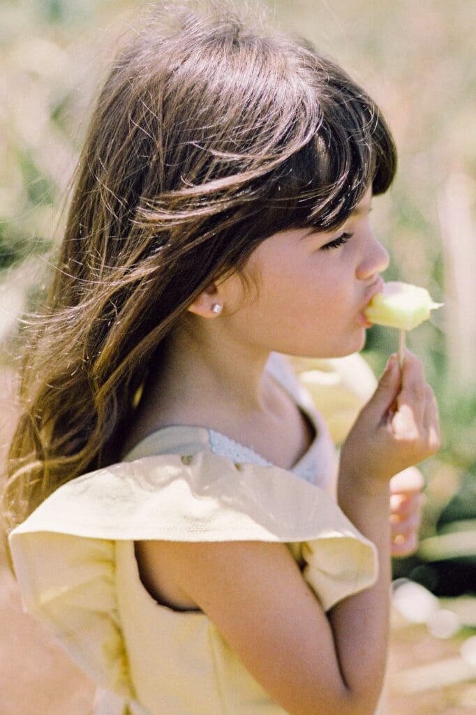 tasting maui gold pineapple in the field